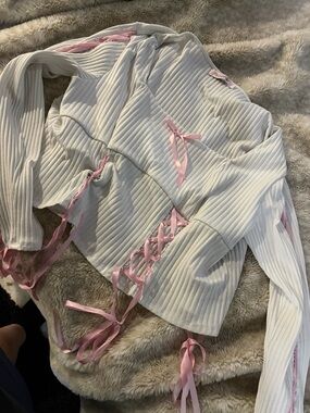 White Ribbed Long-Sleeve Top with Pink Ribbon Detail